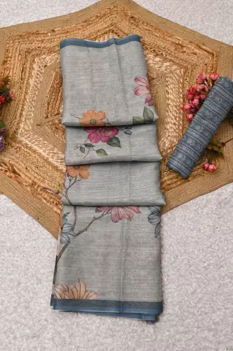 sea green shimmer handloom cotton blend saree with floral print