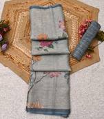 sea green shimmer handloom cotton blend saree with floral print
