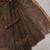 brown shimmer handloom cotton blend saree with floral print
