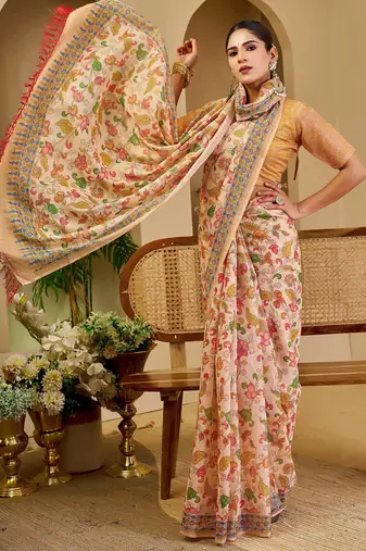 beige pink shimmer handloom cotton blend saree with floral print