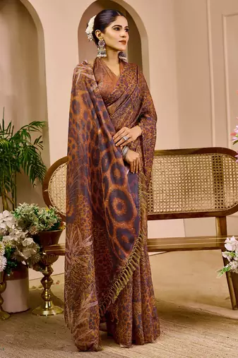 brown shimmer handloom cotton blend saree with floral print