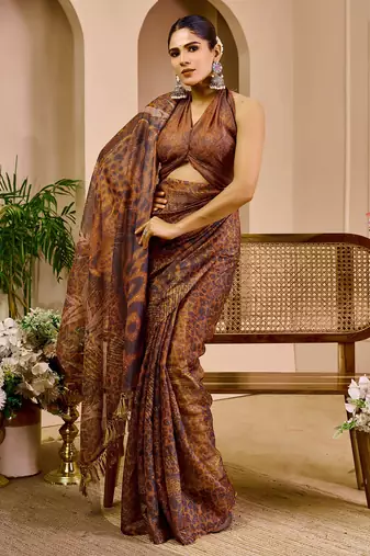 brown shimmer handloom cotton blend saree with floral print