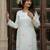 Women Floral Embroidered Silk Kurta with Trousers
