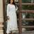Women Floral Embroidered Silk Kurta with Trousers