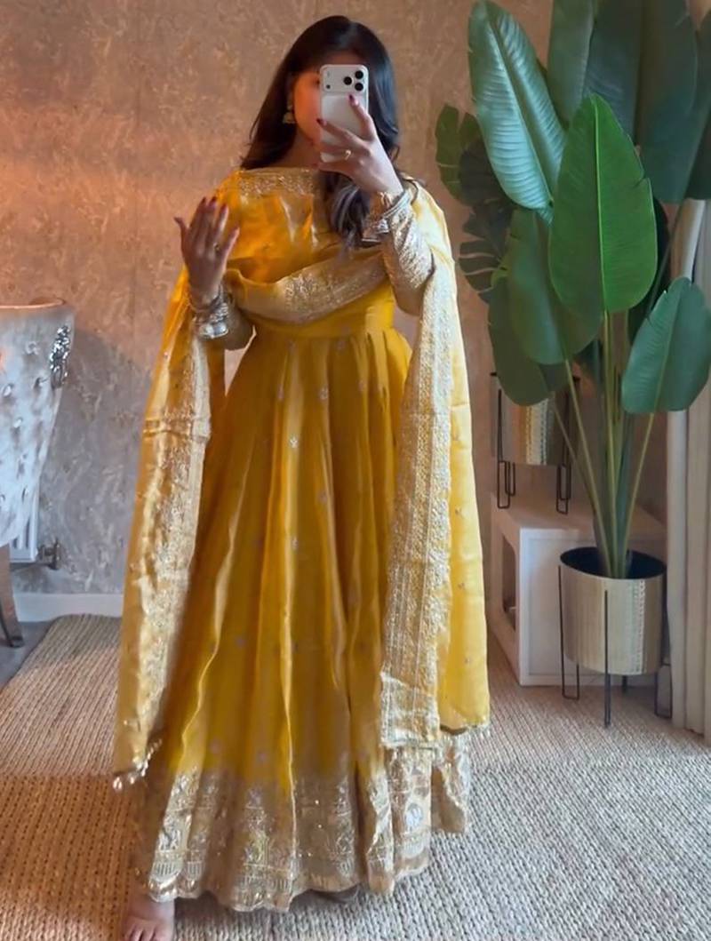 Yellow fendy silk embroidered sequince work anarkali kurta set