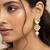 gold plated long pear drop earrings with pearl dangle