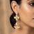 floral kundan dangler earrings with pearl accents
