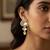 tiered kundan articulated earrings