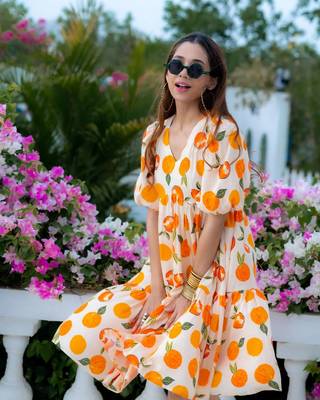 Off-white floral printed rayon ethnic dress for women 3
