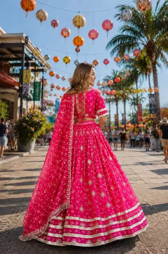 Rani Georgette Free Size Stitched Navratri Lehenga Choli with Bandhej & Embroidery Work