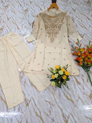 Women's cream crepe straight kurta set with palazzo 5
