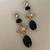 Gold plated black stone crystal dangler earrings