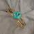 Gold plated turquoise blue stone crystal cuff bracelet