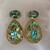 Gold plated green stone swarovski crystal dangler earrings