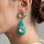 Gold plated turquoise stone mint green crystal dangler earrings