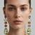 Gold plated multicolor crystal stones dangler earrings