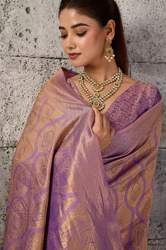 purple kanchipuram silk blend saree with blouse