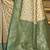 green banarasi silk blend saree with blouse