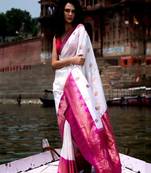 new banarasi silk blend woven saree with blouse