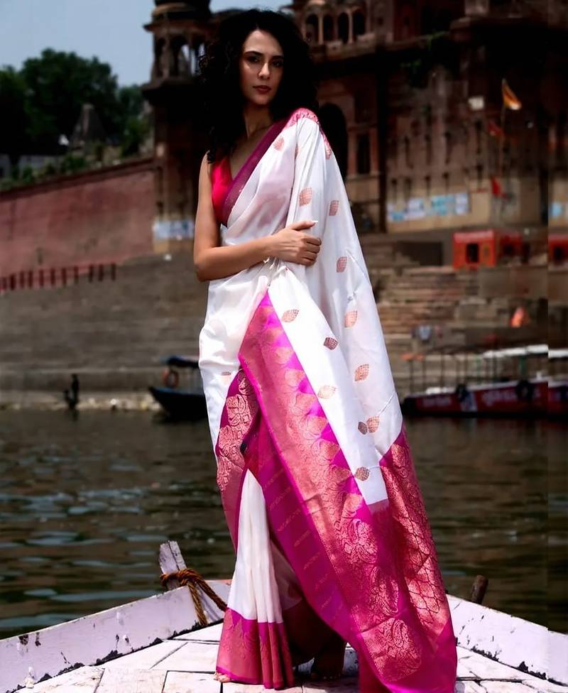 new banarasi silk blend woven saree with blouse