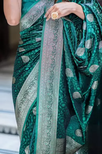 Dark green silk blend zari woven woven saree