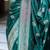Dark green silk blend zari woven woven saree