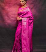 Rani pink silk blend zari woven woven saree