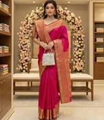 Rani pink silk blend zari woven woven saree
