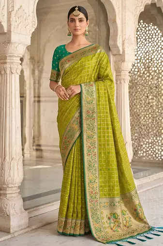 green banarasi silk blend saree with blouse