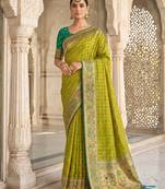 green banarasi silk blend saree with blouse