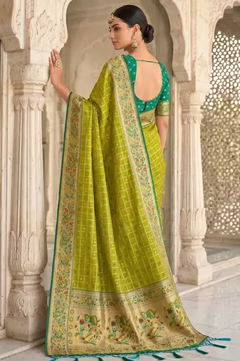 green banarasi silk blend saree with blouse
