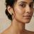 Gold plated green polki stud earrings