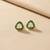Gold plated green polki stud earrings
