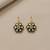 Gold plated green polki stones stud earrings