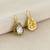 Gold plated green polki drop earrings