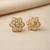 Gold plated yellow polki floral stud earrings