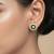 Gold plated green polki stone stud earrings