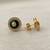 Gold plated green polki stone stud earrings