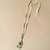 Gold plated green polki stone long necklace