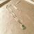 Gold plated green polki stone long necklace
