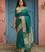 dark green silk blend saree with blouse