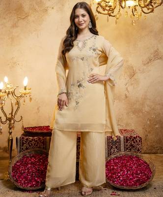 Women's yellow embroidered silk blend kurta set with dupatta and palazzo 4