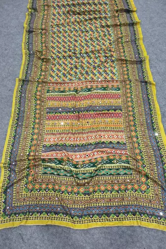 Women   s mustard yellow printed saree with traditional beautiful print and with real mirror work