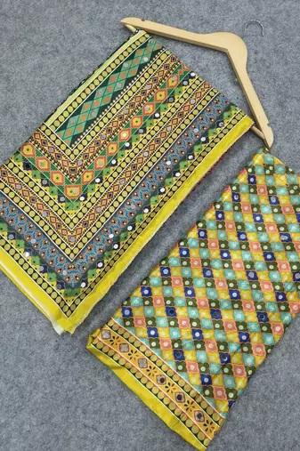 Women   s mustard yellow printed saree with traditional beautiful print and with real mirror work