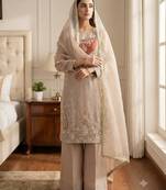 Beige heavy embroidered kurti pant set with lace dupatta for festive wear