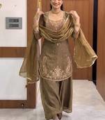 Gold heavy embroidered kurti pant set with lace dupatta for festive wear