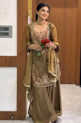 Gold heavy embroidered kurti pant set with lace dupatta for festive wear