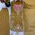 Gold heavy embroidered kurti pant set with lace dupatta for festive wear
