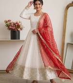 Designer off-white silk blend flared gown suit with contrast red heavy embroidered dupatta & trouser set for women