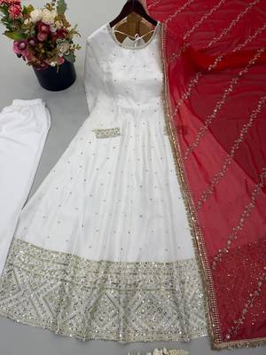 Designer off-white silk blend flared gown suit with contrast red heavy embroidered dupatta & trouser set for women 4